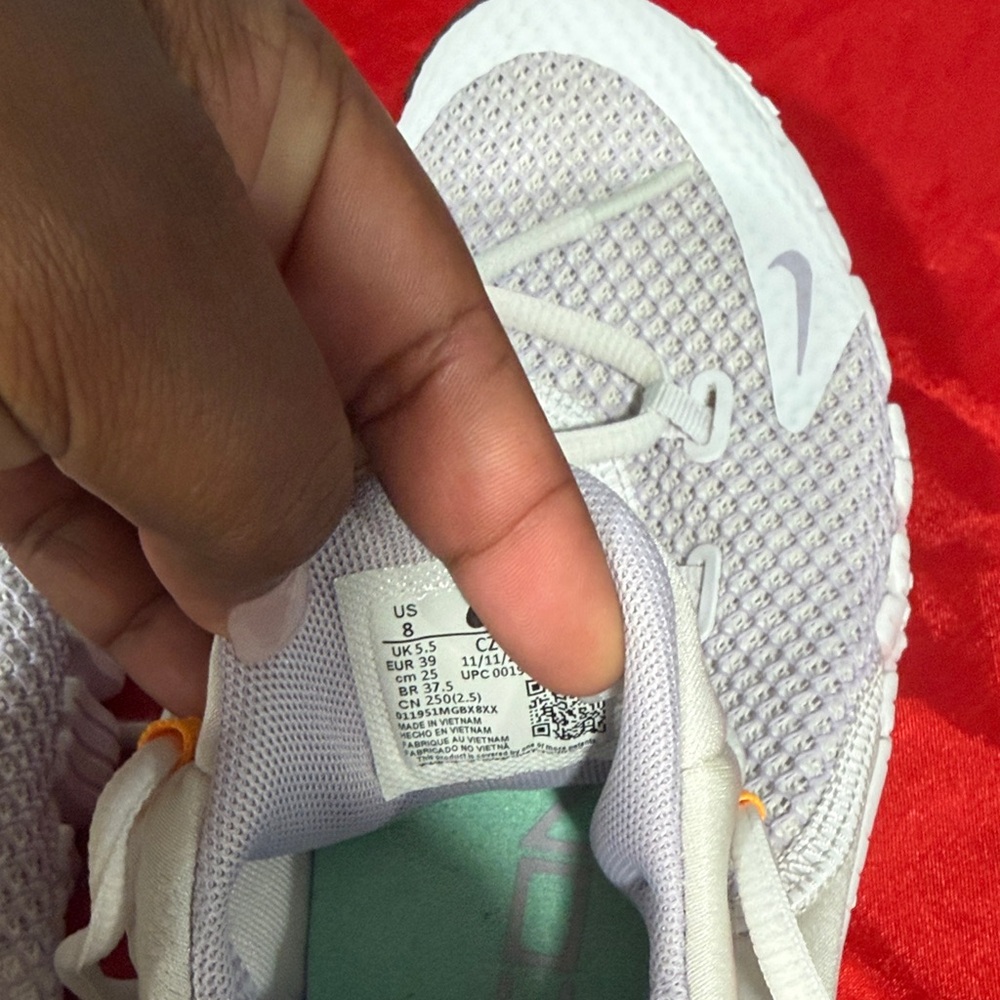 Nike White Sneakers with Green and Orange Accents - Picture 7 of 7